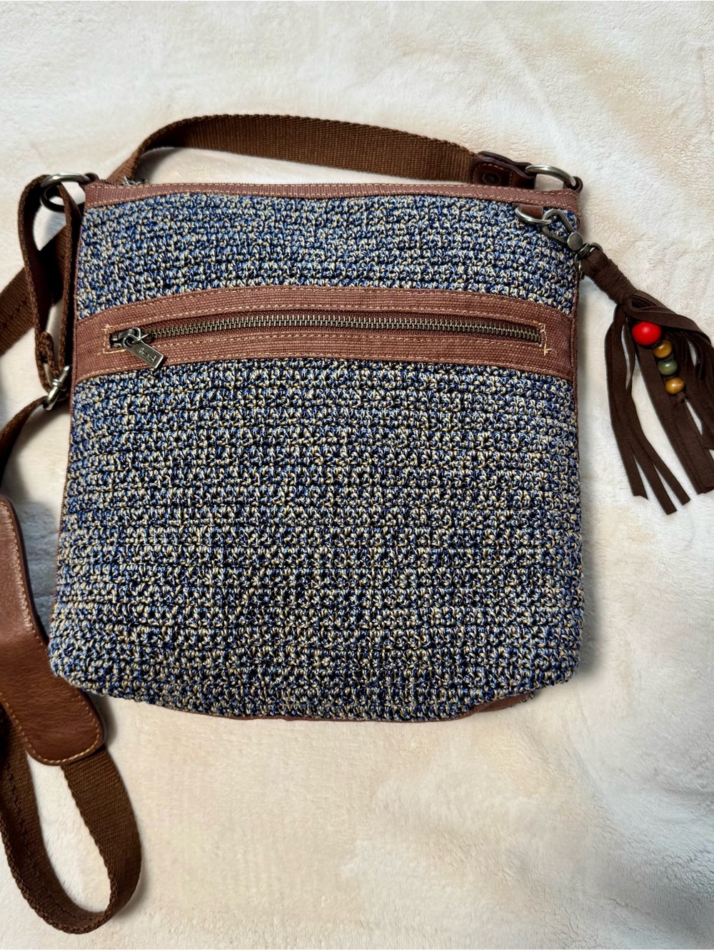 The Sak Lucia Crochet Navy, Brown & Beige Crossbody Bag with Brown Trim